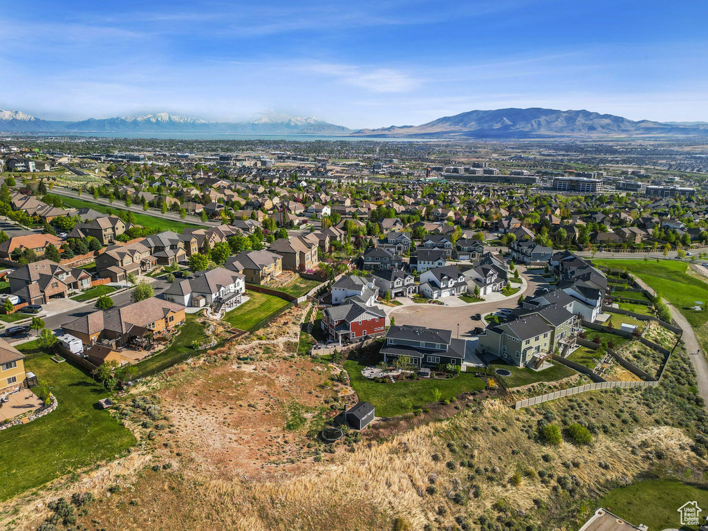 Drone / aerial view featuring a mountain view and a residential view