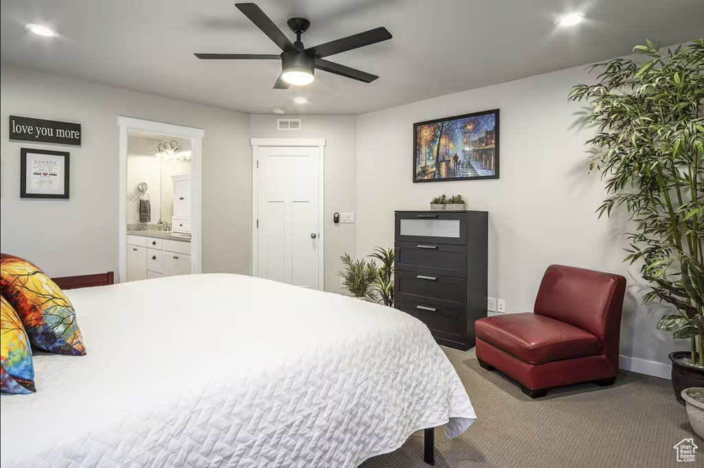 Bedroom with ceiling fan, ensuite bath, baseboards, carpet, and recessed lighting