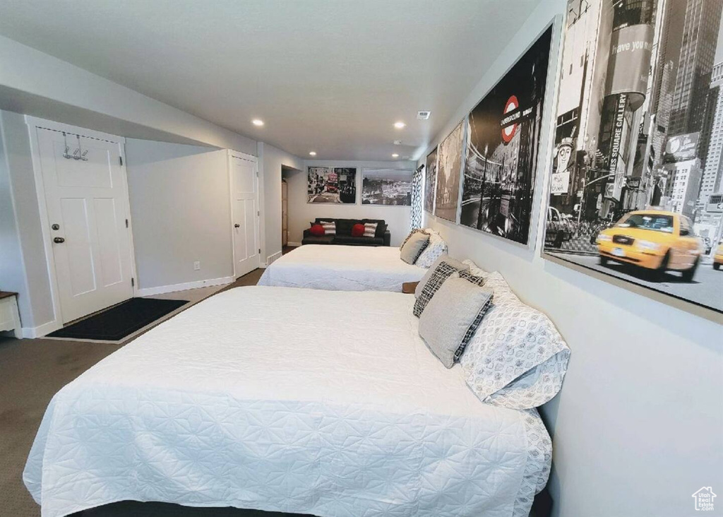Bedroom with recessed lighting and carpet