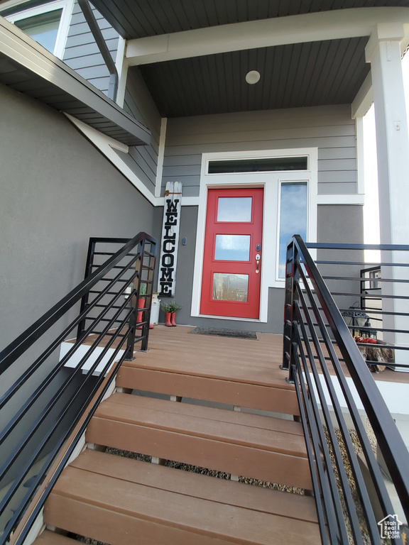Property entrance with stucco siding