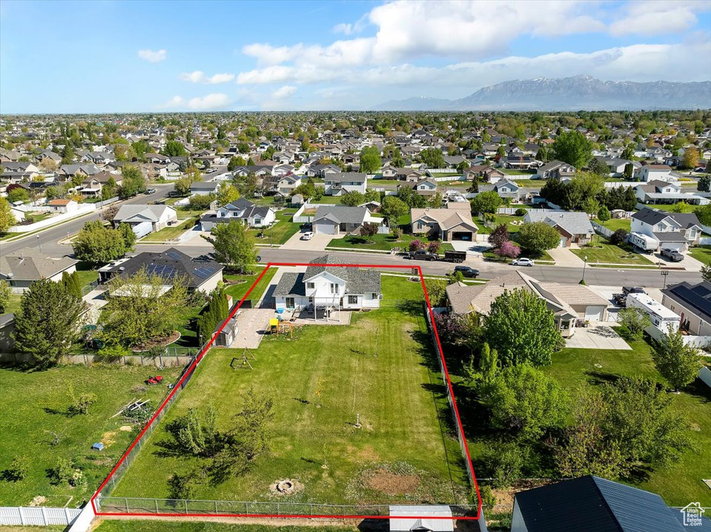 Drone / aerial view featuring a residential view and a mountain view