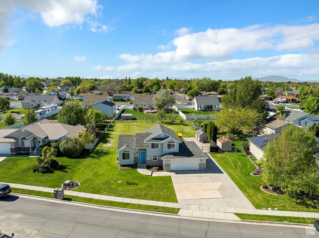 Drone / aerial view featuring a mountain view and a residential view