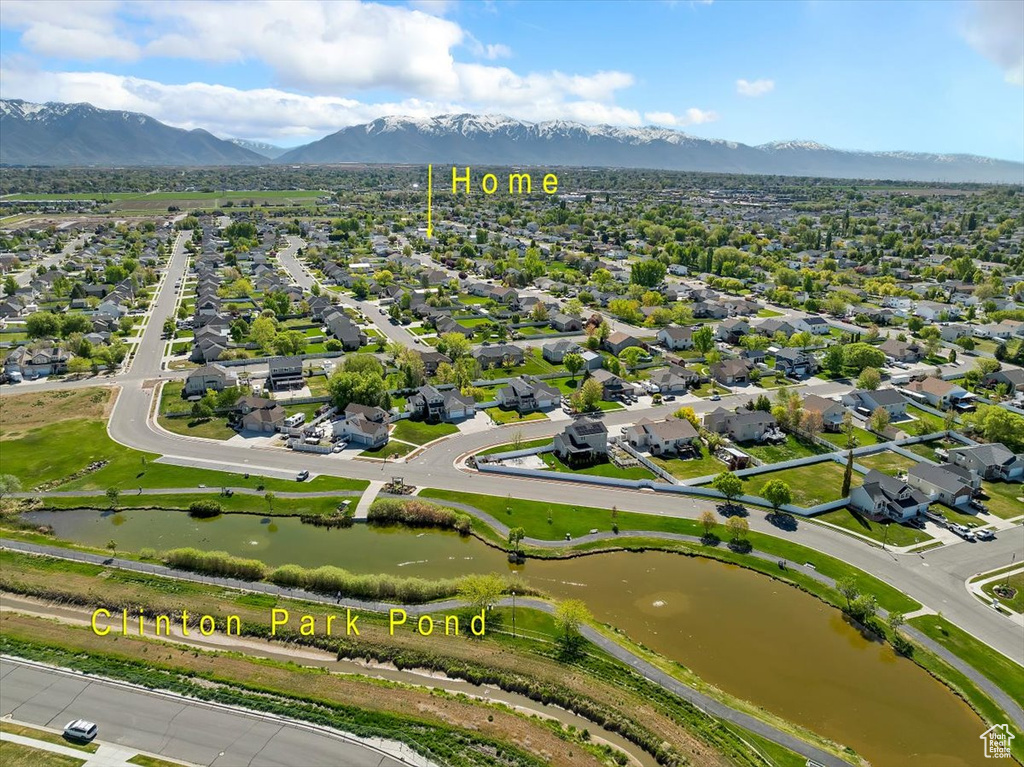 Bird's eye view featuring a water and mountain view and a residential view