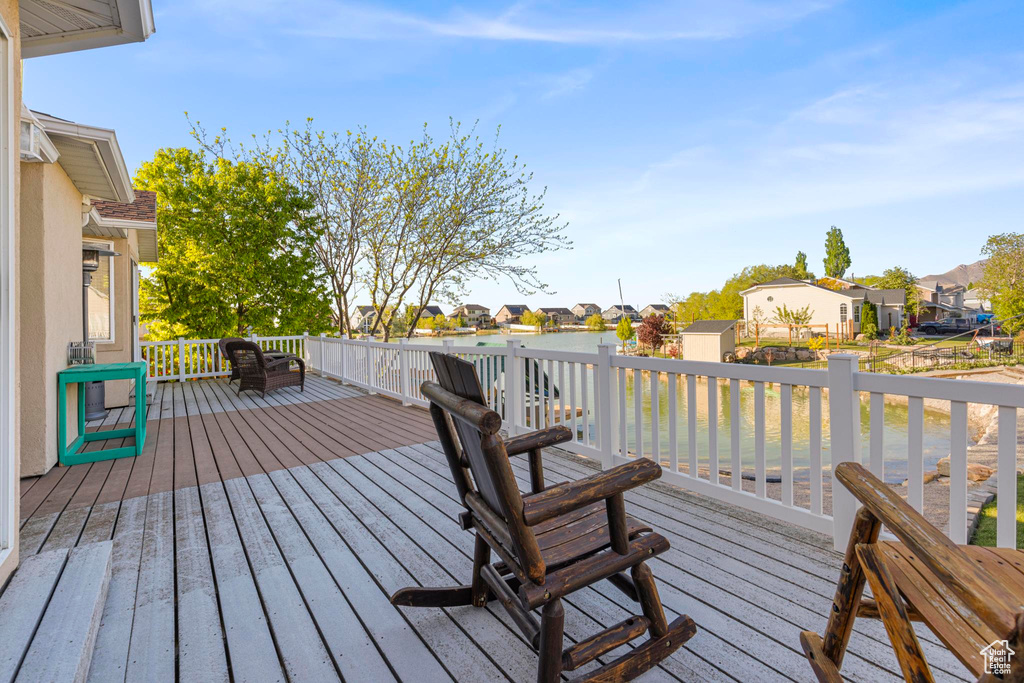 Wooden deck featuring a residential view