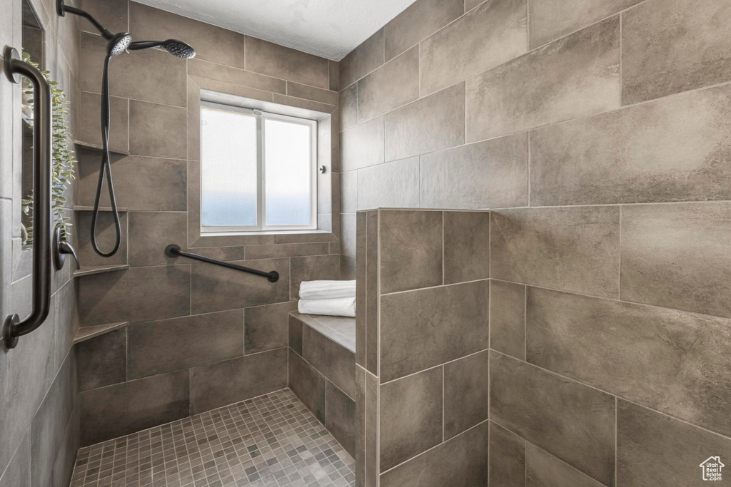 Bathroom with tiled shower