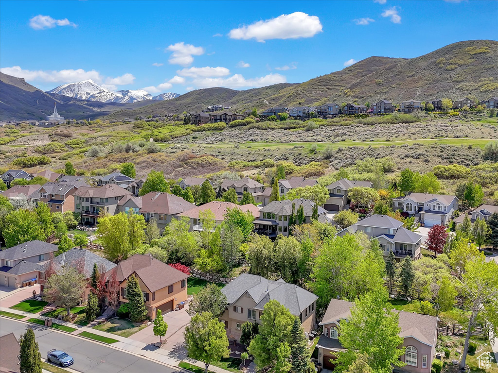 Drone / aerial view with a residential view and a mountain view
