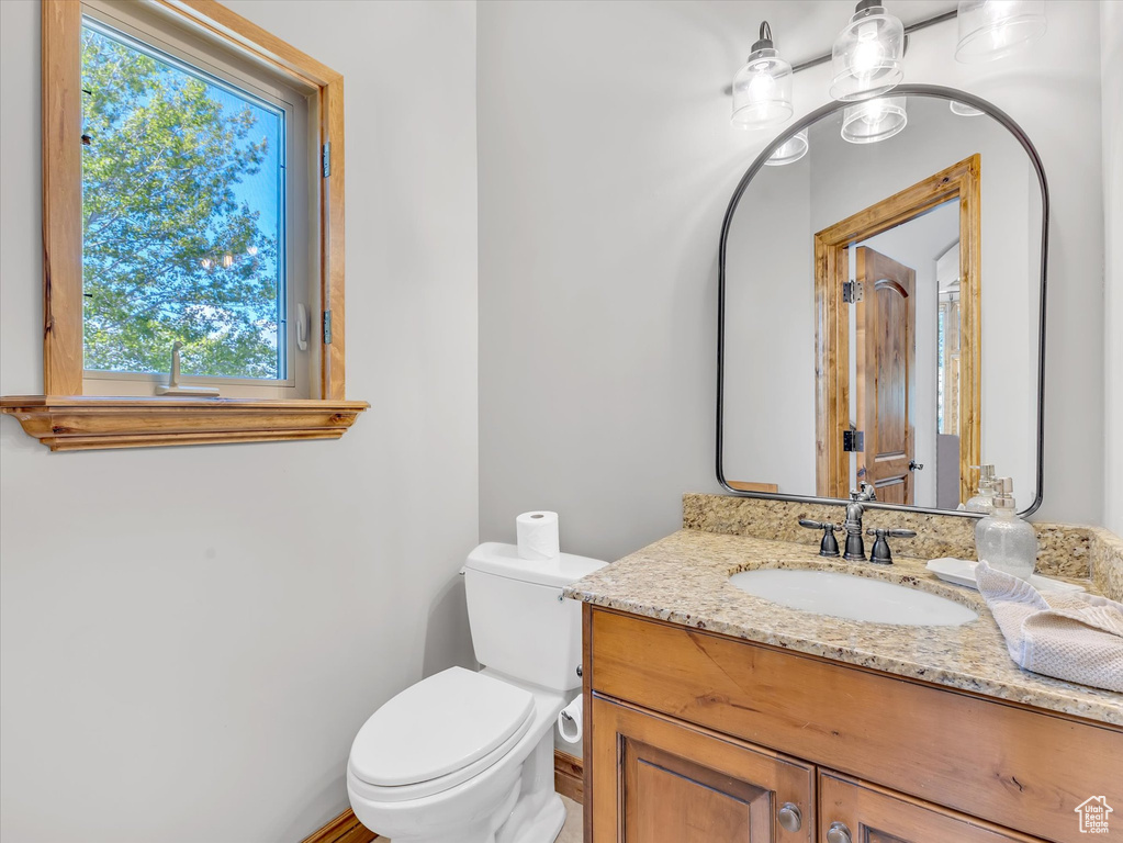 Bathroom with vanity and toilet