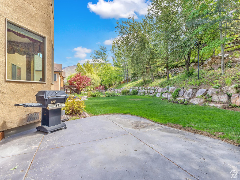 View of patio / terrace featuring a grill
