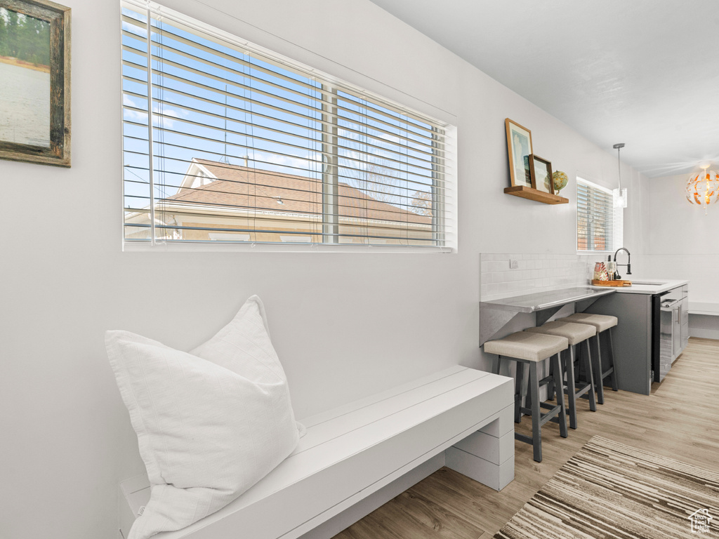 Interior space featuring a sink and light wood-style flooring