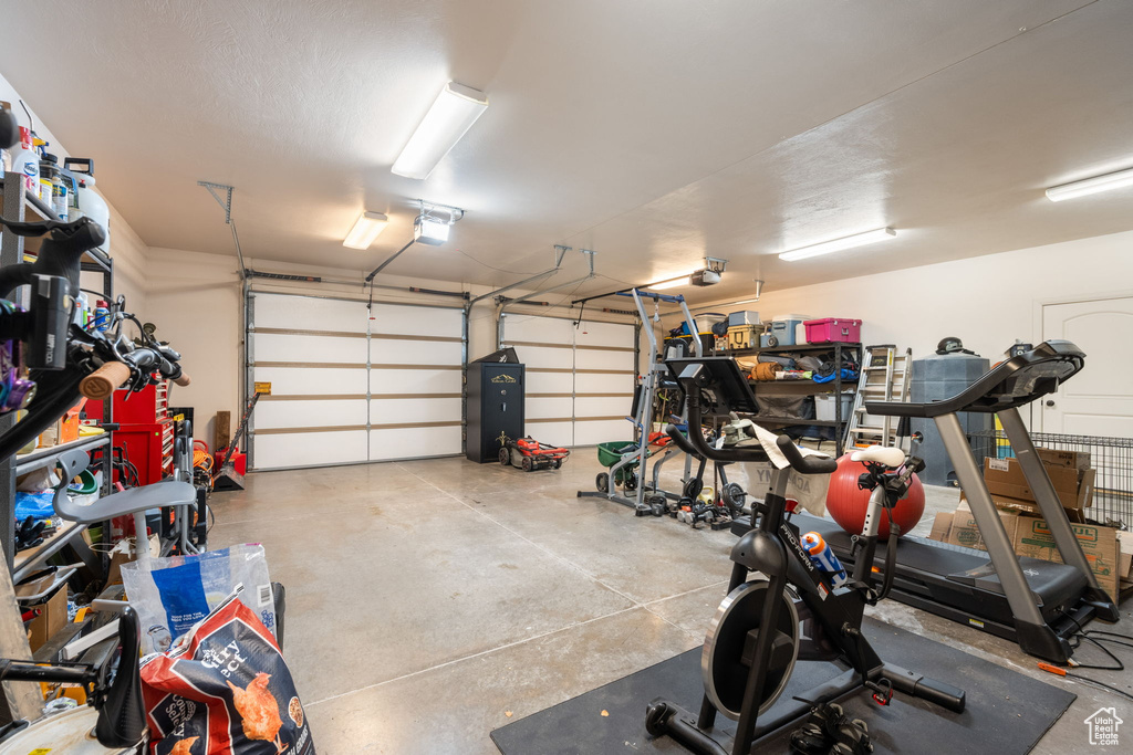 Garage featuring a garage door opener