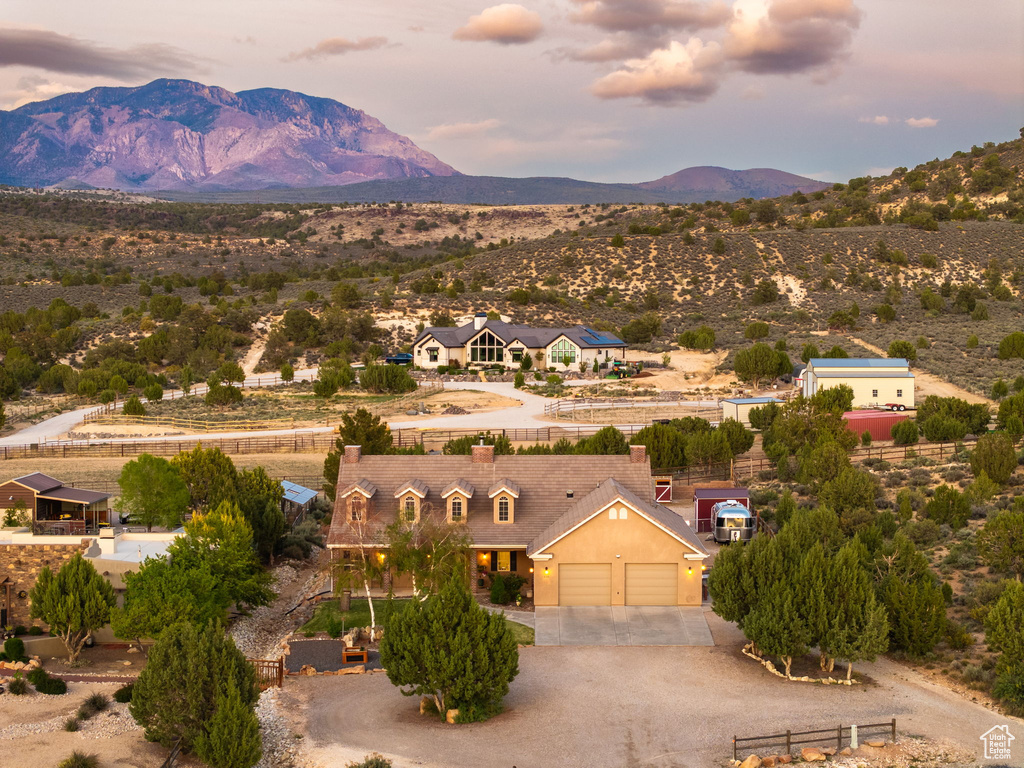 Birds eye view of property featuring a mountain view