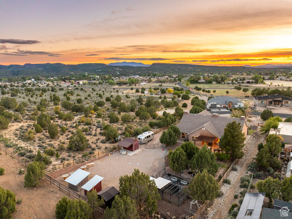 Aerial view at dusk featuring a mountain view