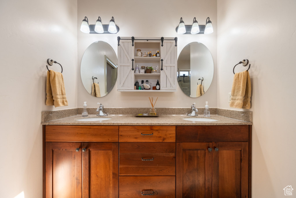 Bathroom with double vanity and a sink
