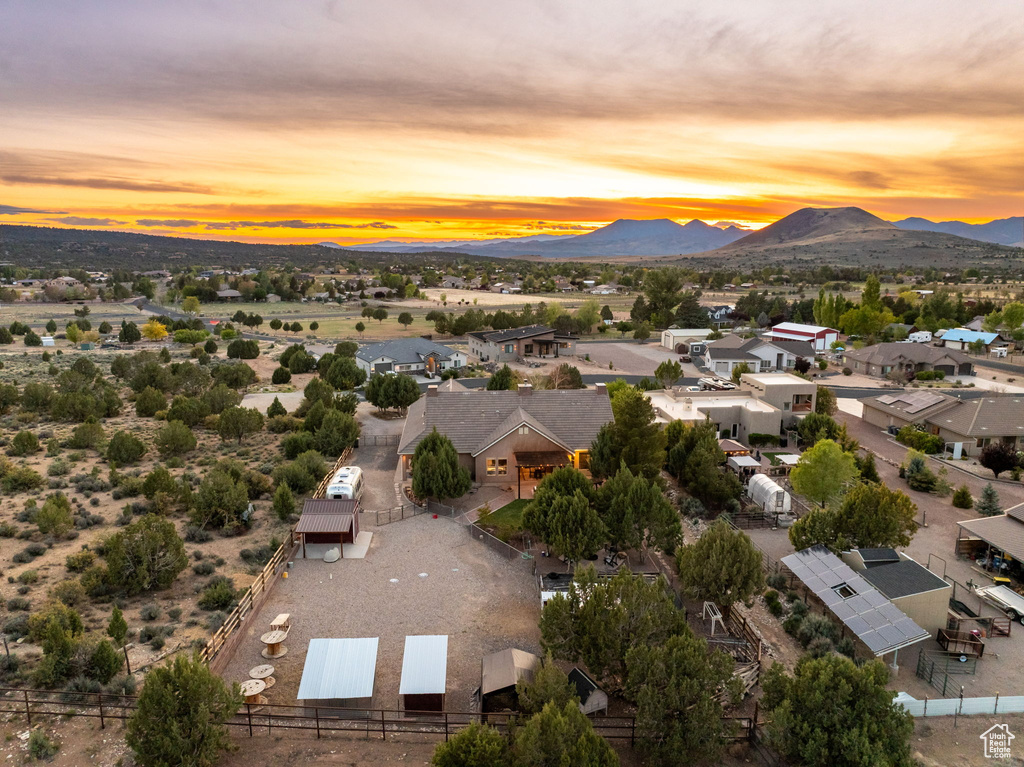 Aerial view at dusk with a mountain view and a residential view