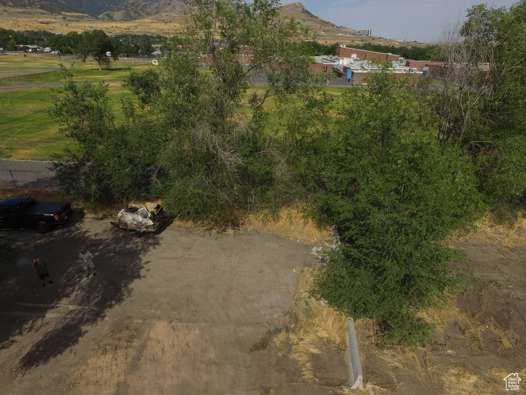 Birds eye view of property with a mountain view
