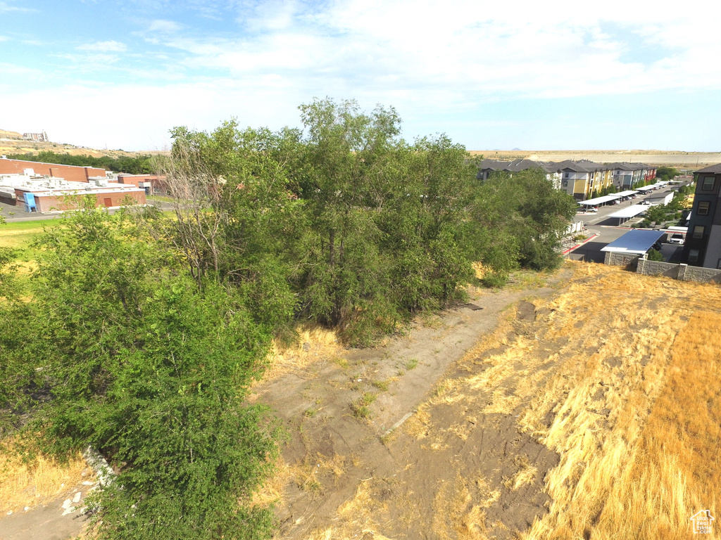 Birds eye view of property with a residential view
