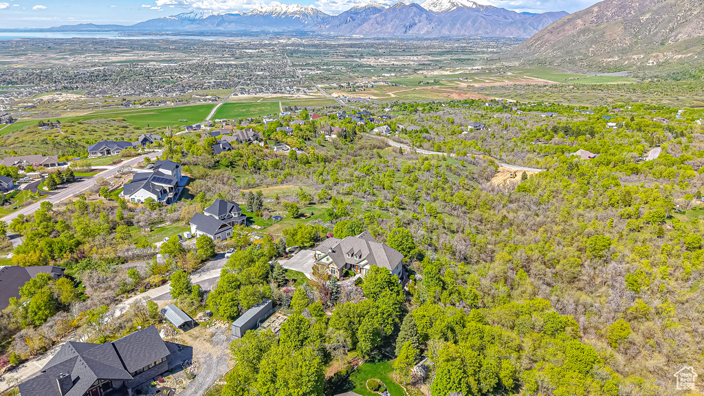 Drone / aerial view with a mountain view and a residential view
