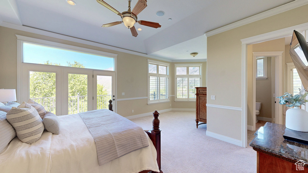 Bedroom with access to exterior, crown molding, baseboards, light carpet, and recessed lighting