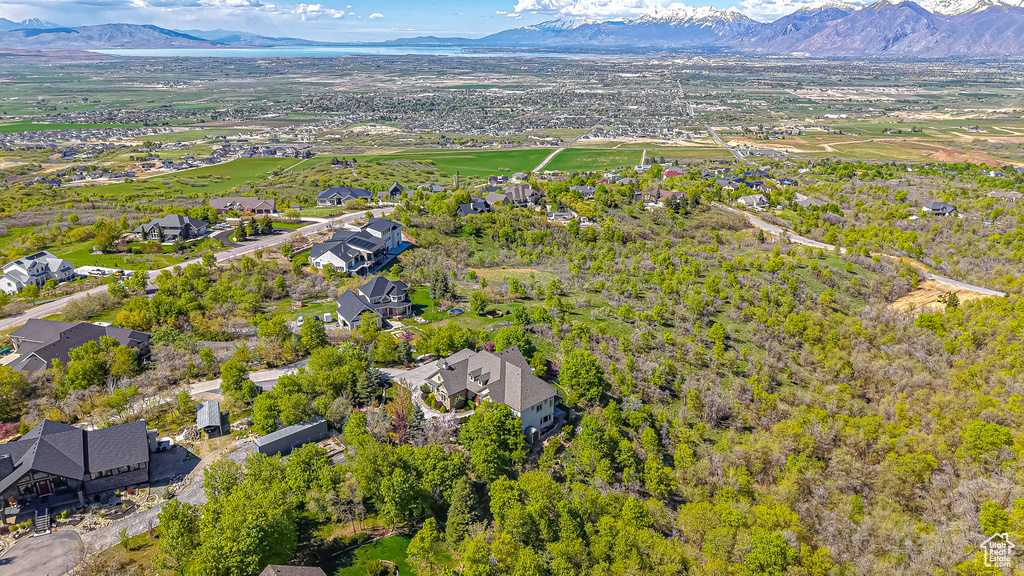 Drone / aerial view with a residential view and a mountain view