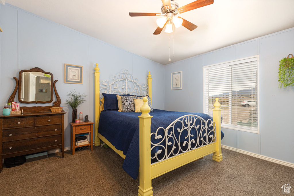 Bedroom featuring carpet flooring and a ceiling fan