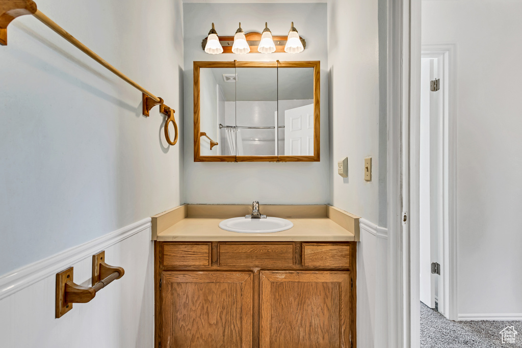 Full bathroom featuring vanity
