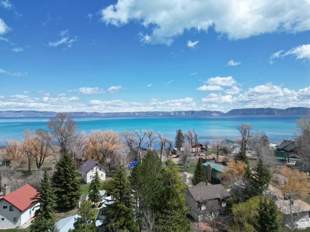 Bird\'s eye view with a water and mountain view