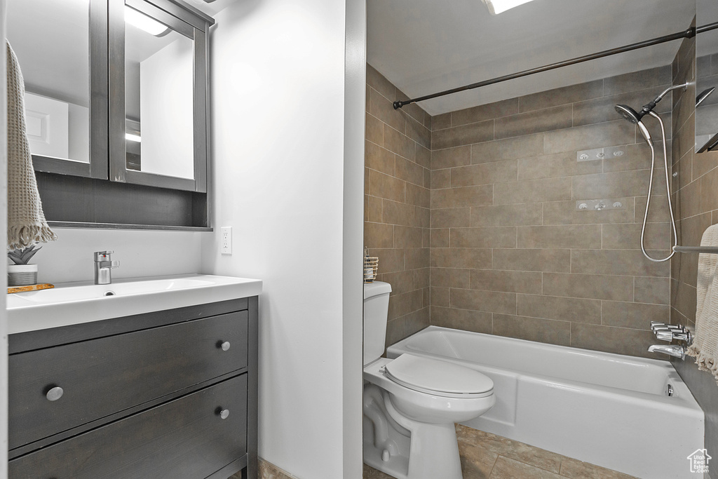 Full bath featuring toilet, shower / tub combination, and vanity