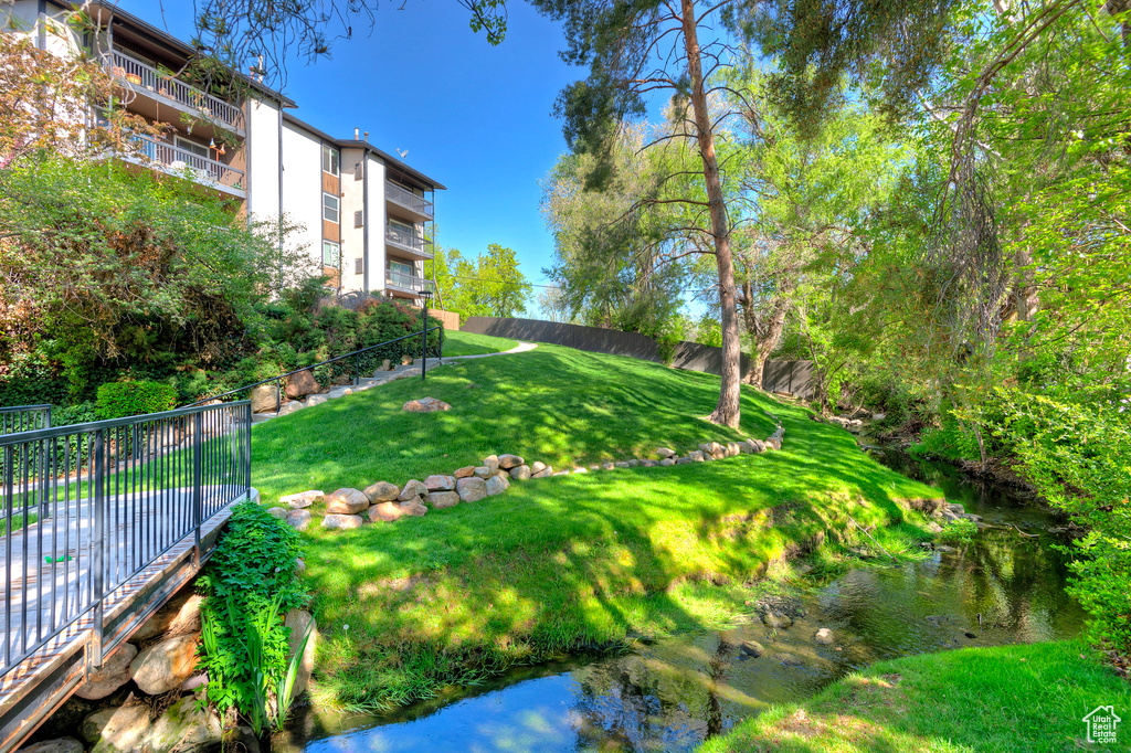 Surrounding community with a yard and fence