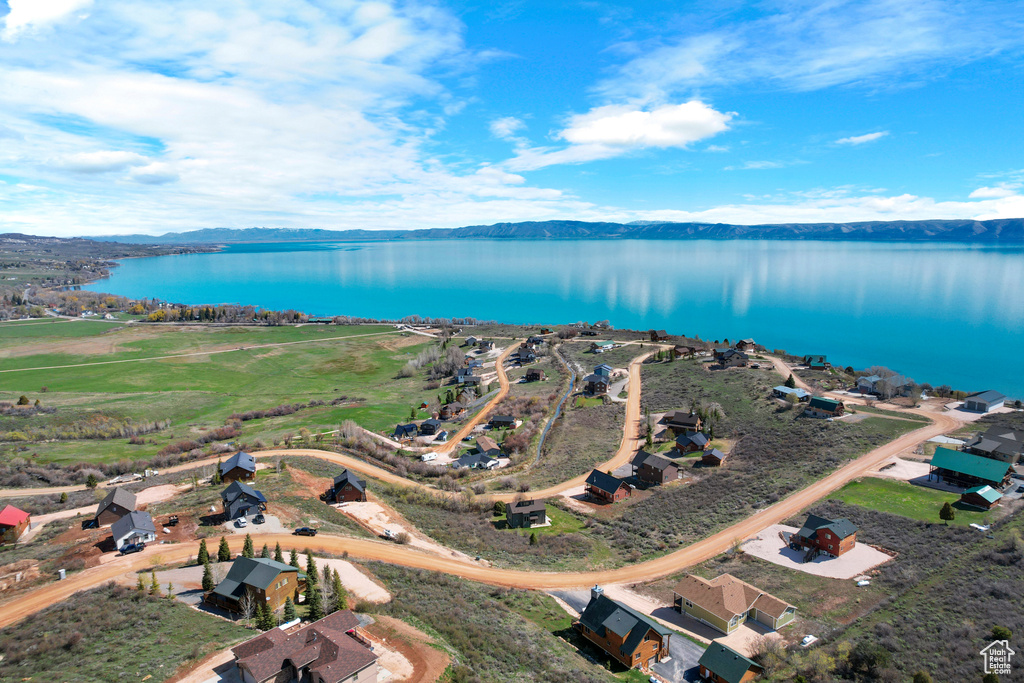 Bird's eye view with a water and mountain view