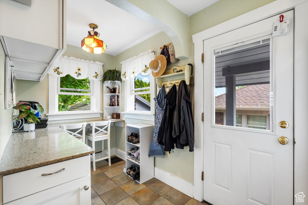 Mudroom with baseboards and plenty of natural light