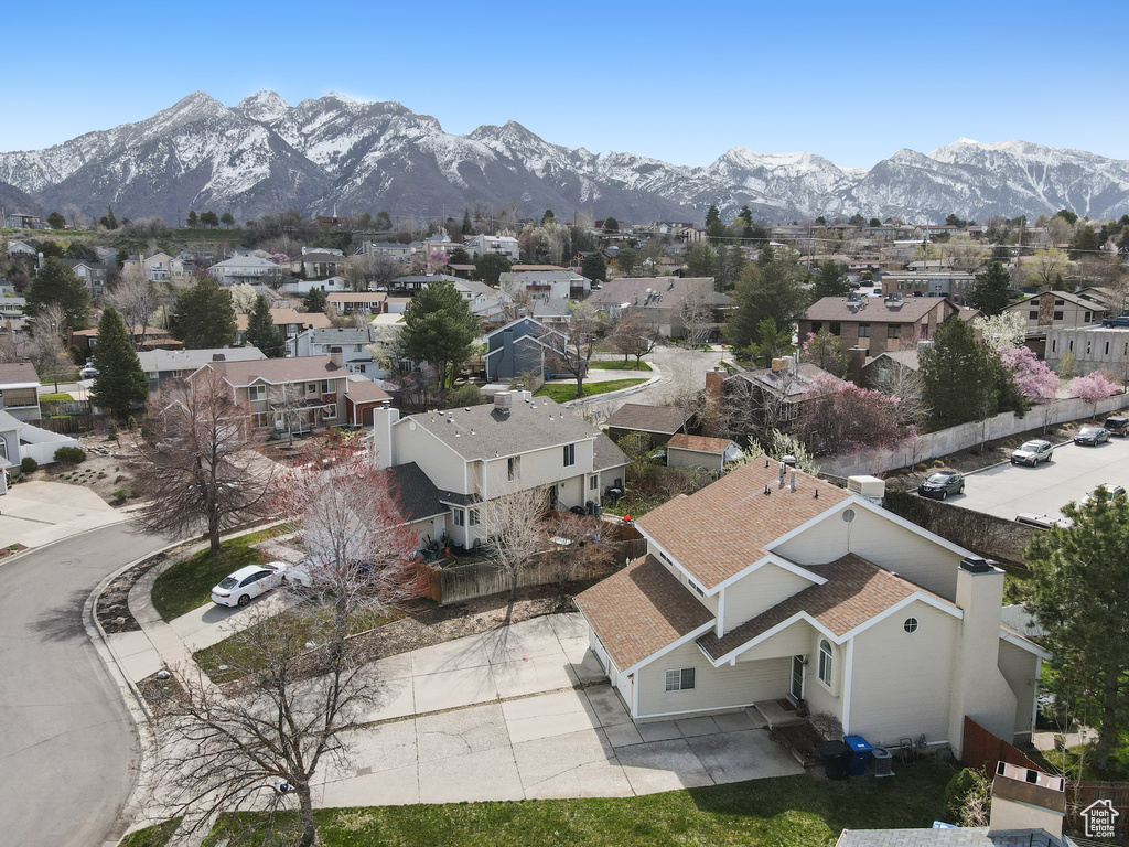 Aerial view featuring a mountain view and a residential view