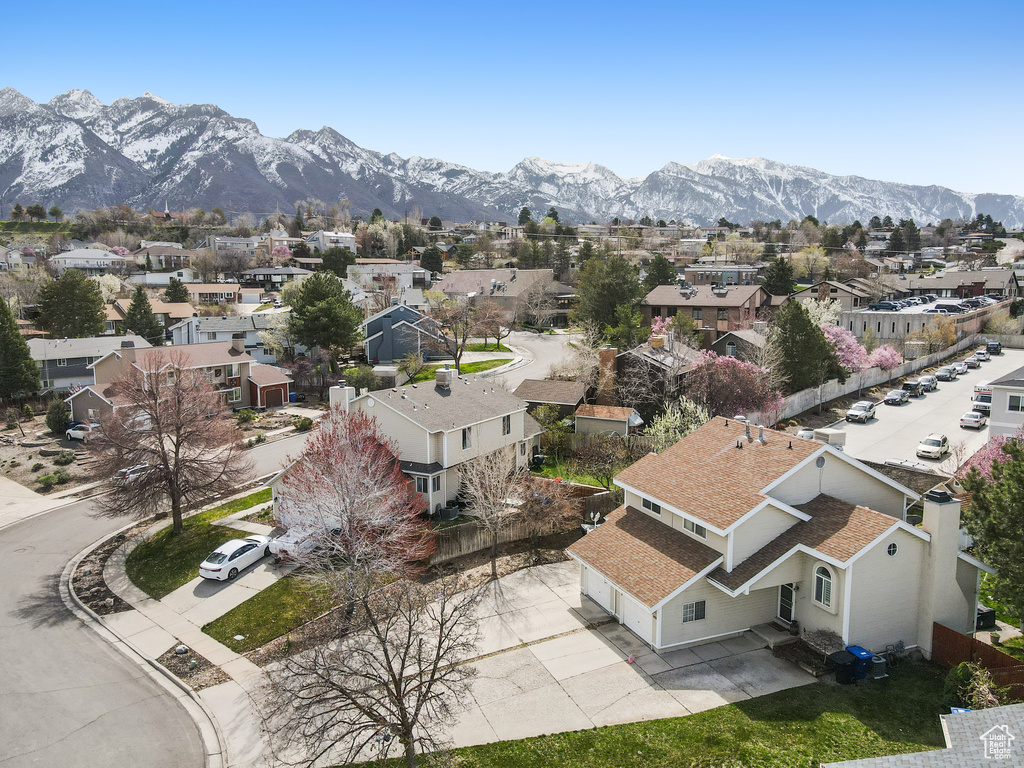 Drone / aerial view featuring a mountain view and a residential view