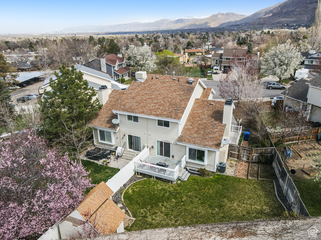 Drone / aerial view featuring a mountain view and a residential view