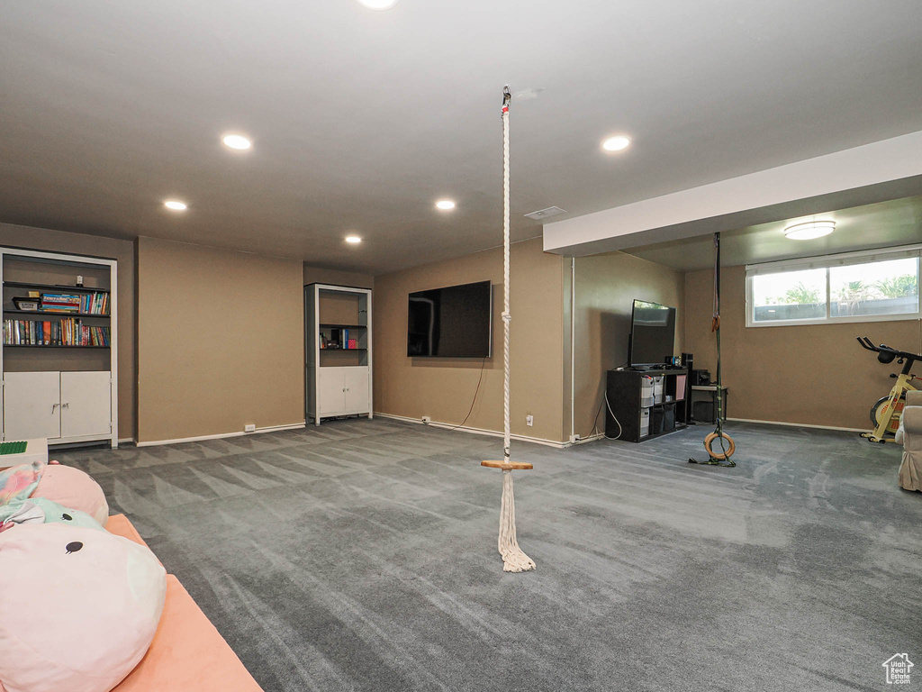Recreation room featuring recessed lighting, carpet, and baseboards