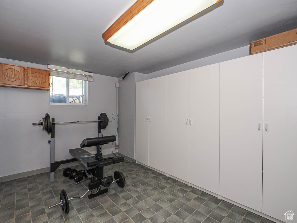 Exercise room featuring baseboards