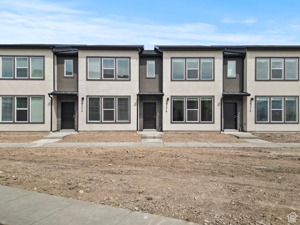 Multi unit property featuring stucco siding