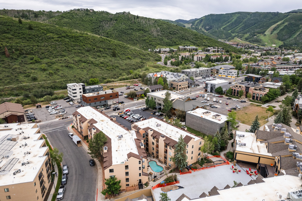 Birds eye view of property with a mountain view
