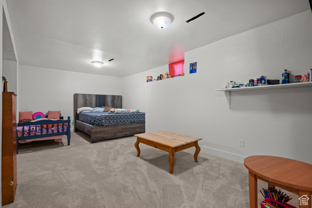 Bedroom featuring carpet