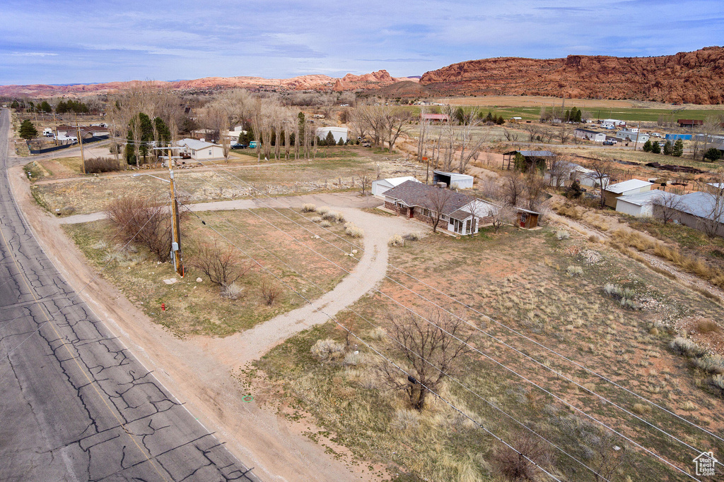 Drone / aerial view with a mountain view and a rural view