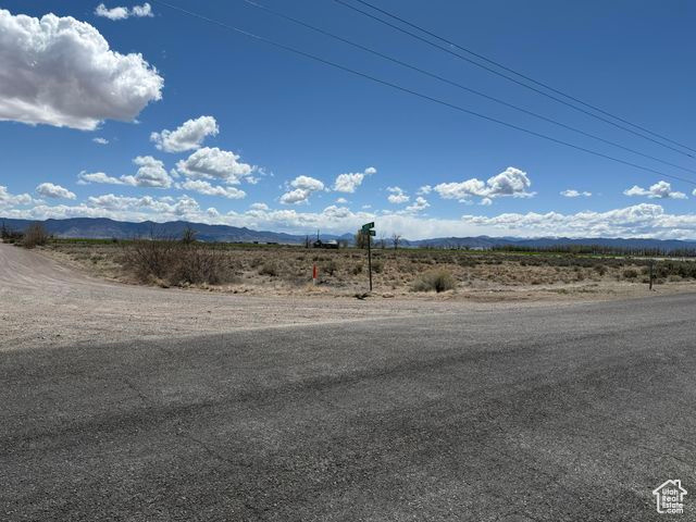 Exterior space with a rural view and a mountain view