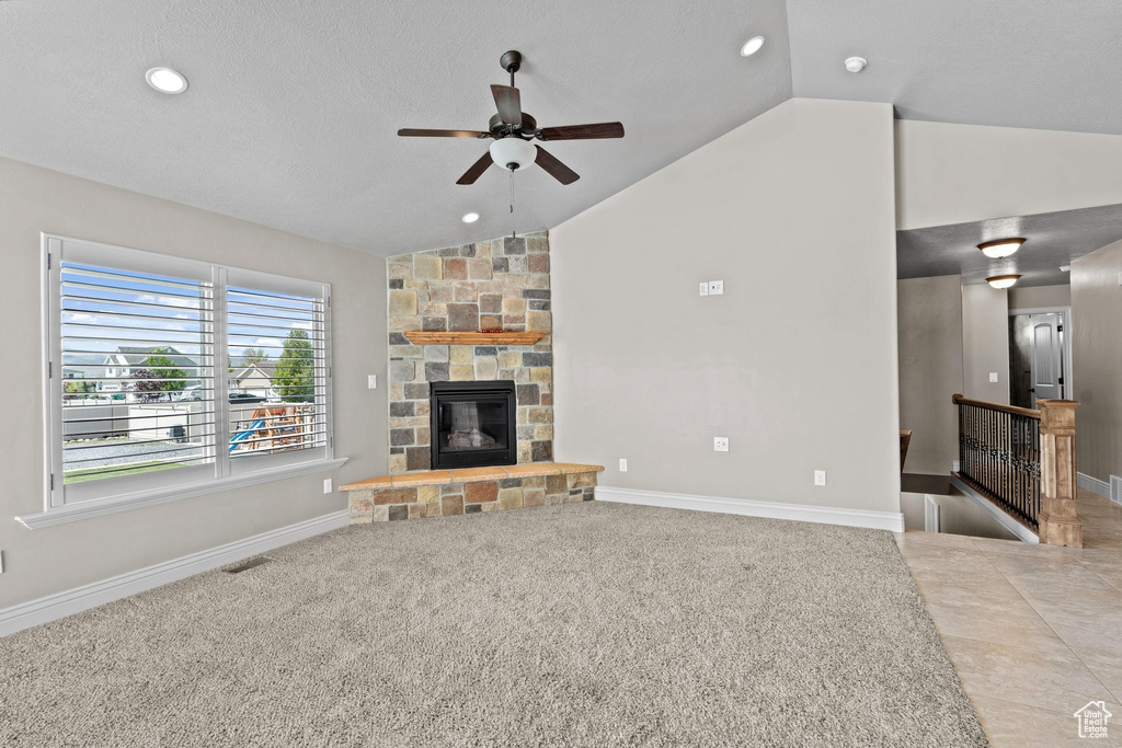 Unfurnished living room with visible vents, recessed lighting, ceiling fan, and lofted ceiling