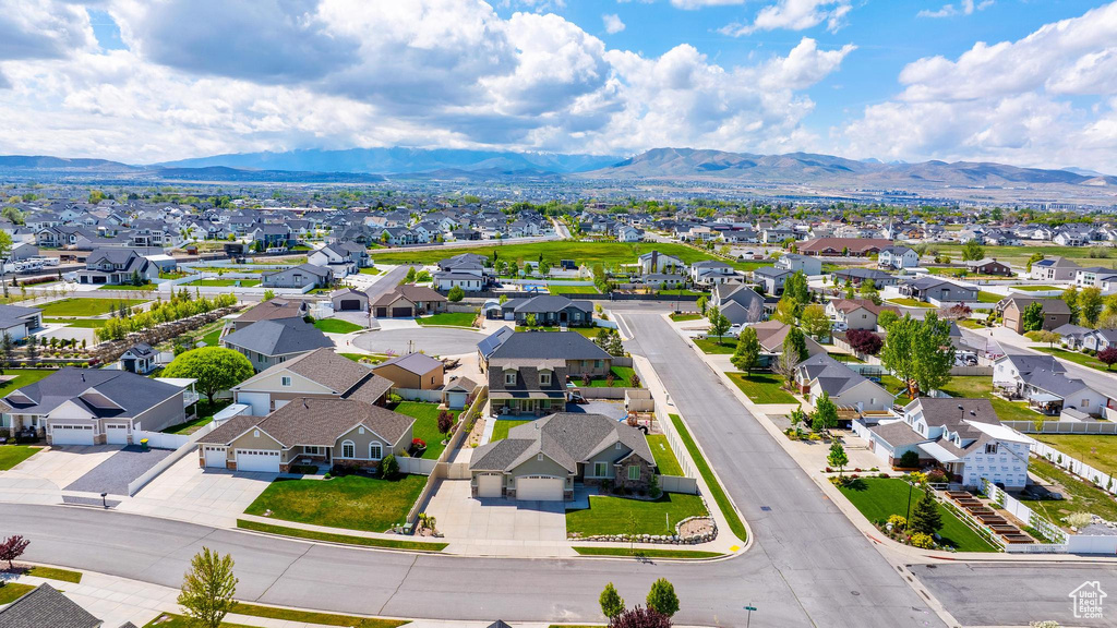 Drone / aerial view featuring a residential view and a mountain view