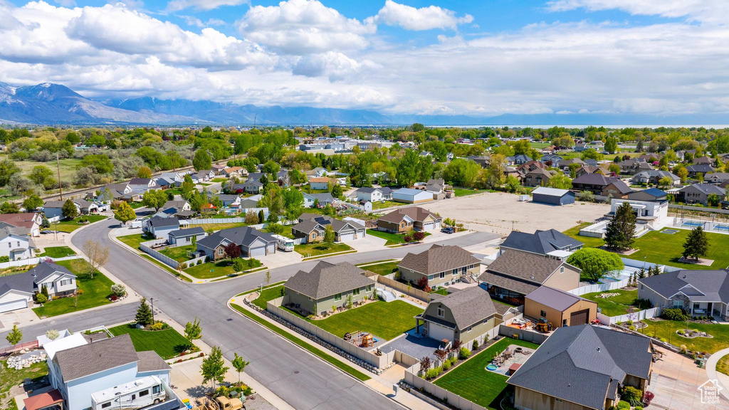 Birds eye view of property featuring a mountain view and a residential view