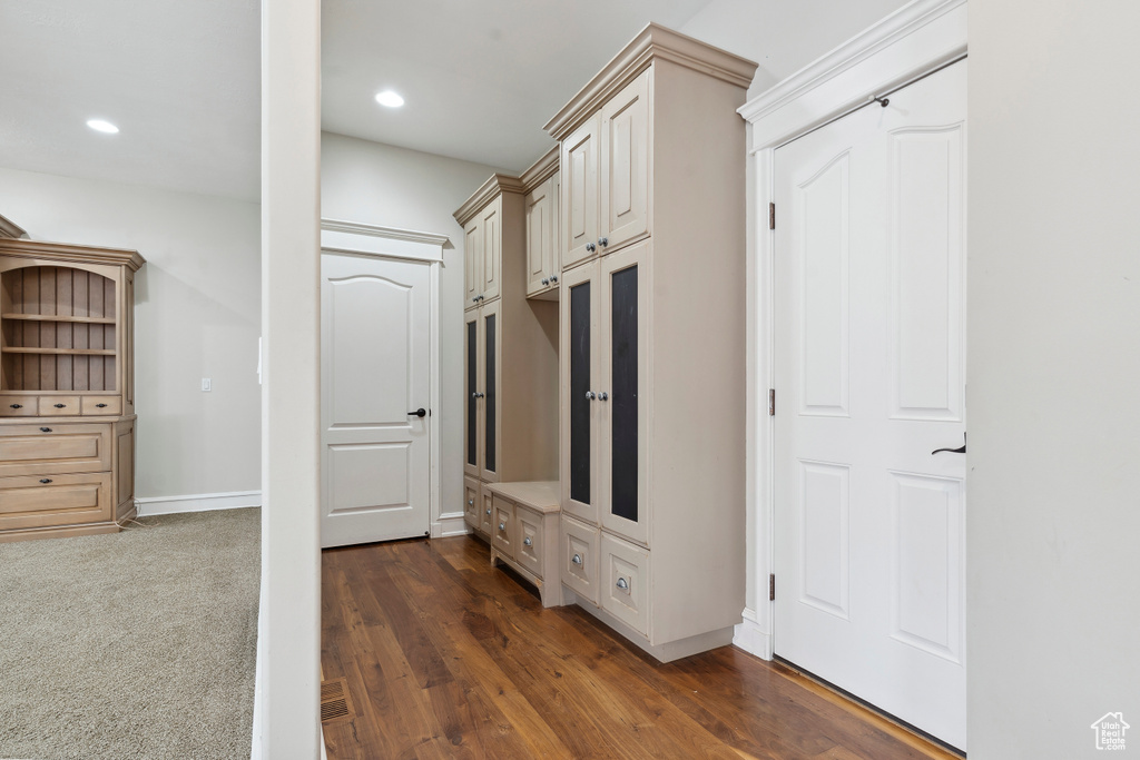 Mudroom featuring baseboards, recessed lighting, and dark wood-type flooring