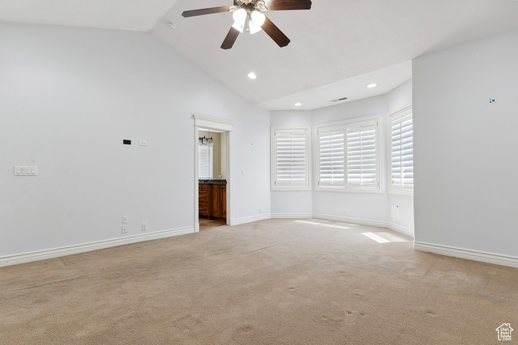 Unfurnished bedroom with carpet floors, recessed lighting, baseboards, and ensuite bathroom