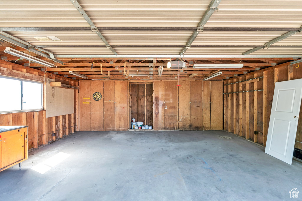 Garage featuring a garage door opener