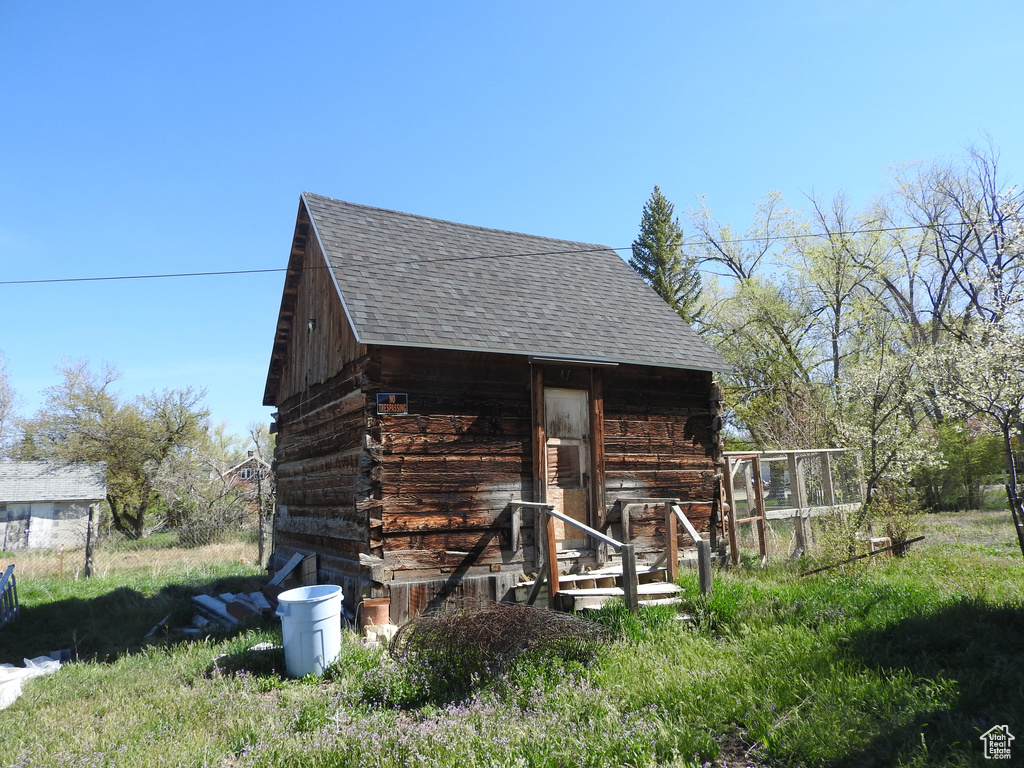 View of outbuilding featuring an outdoor structure