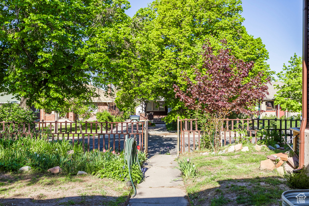 View of yard featuring fence