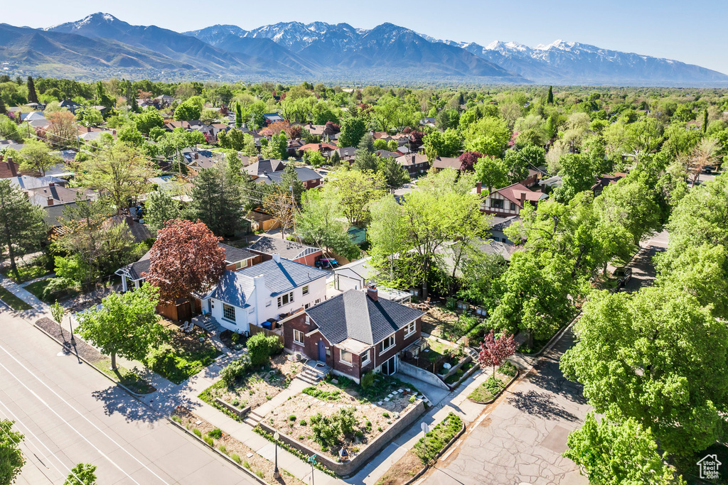 Birds eye view of property with a residential view and a mountain view