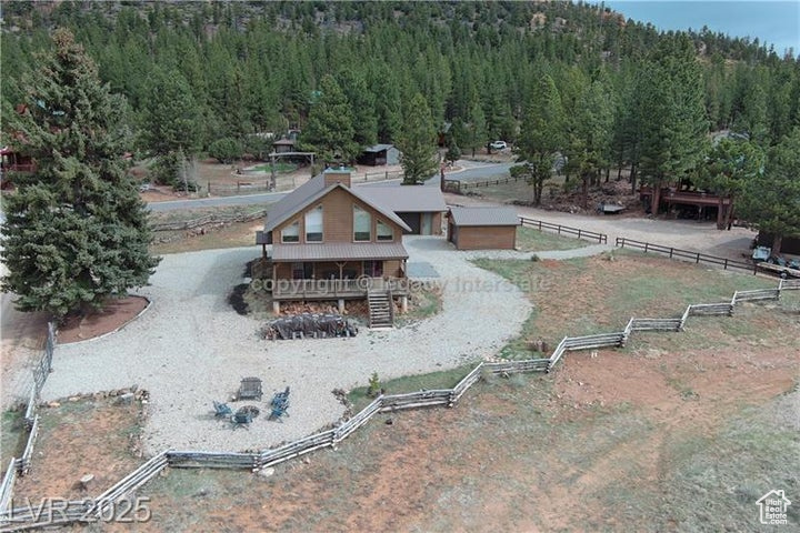 View of property\'s community with a view of trees and fence